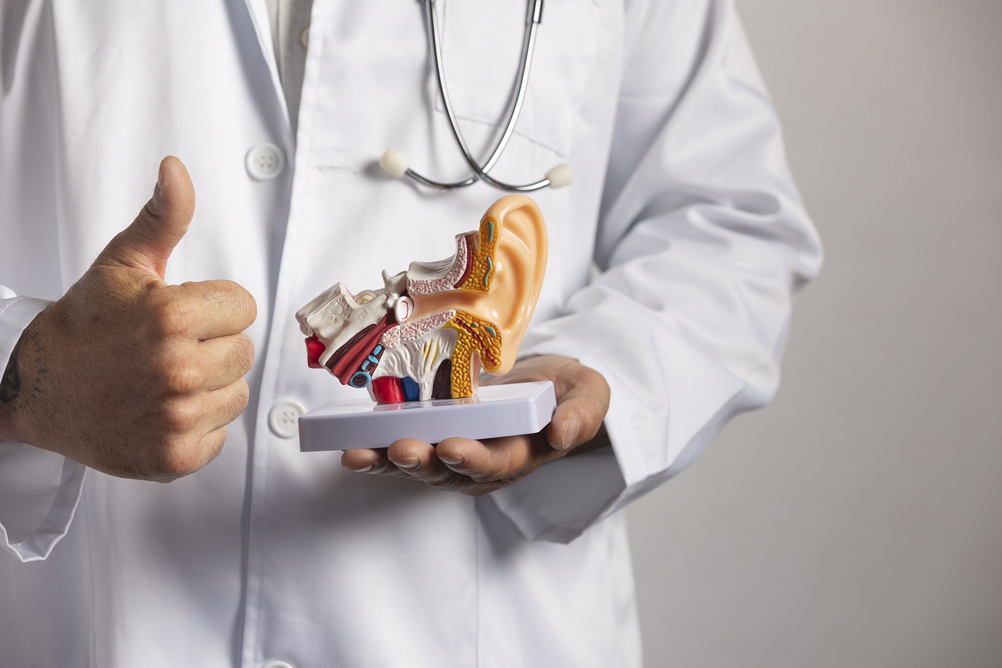 Audiologist holding an otoscope